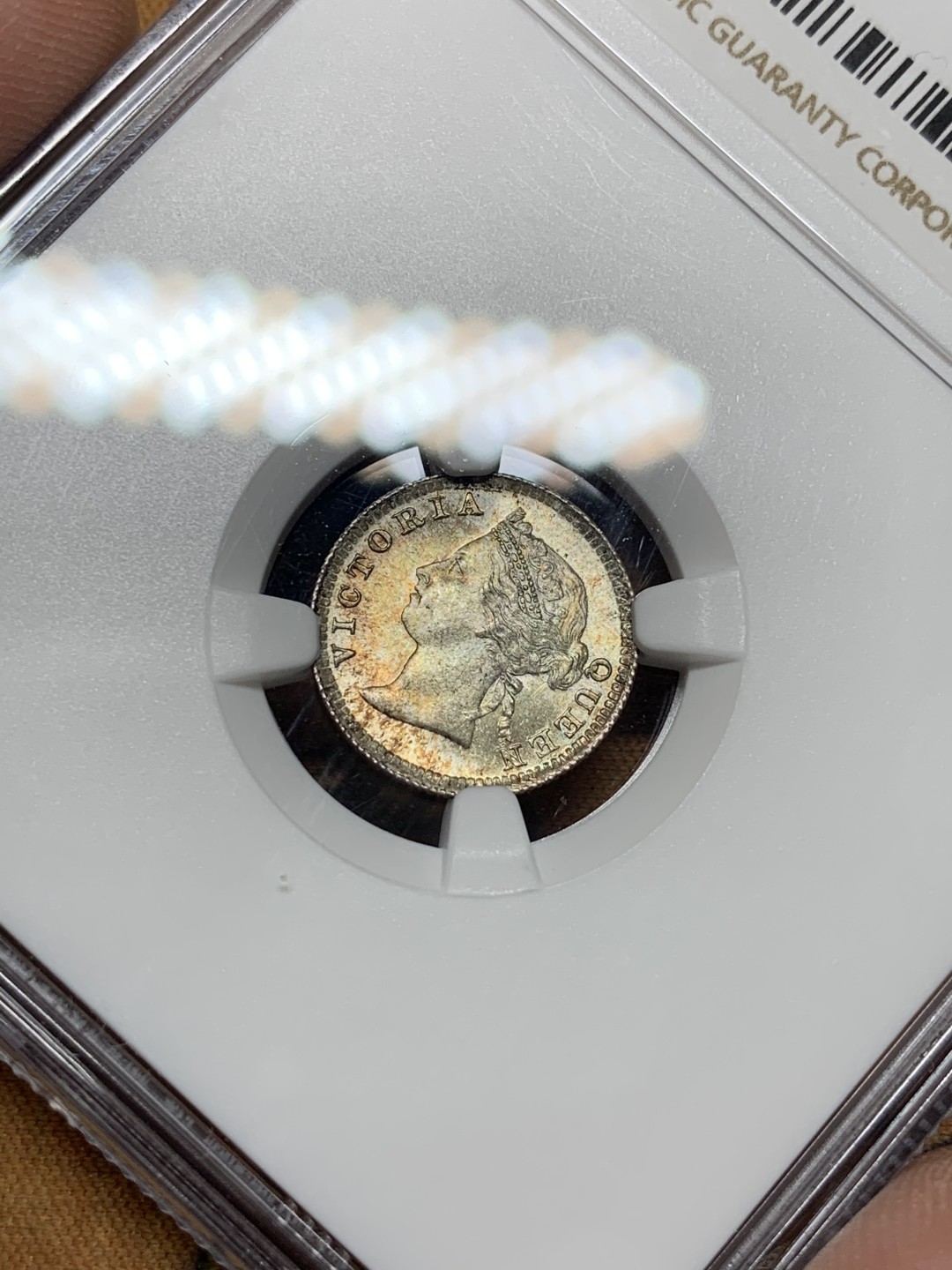 《竞宝斋》第106场-周日，周一 2场连拍（全场包邮） NGC MS63 香港 1901 5仙银币 双面五彩 十字转光