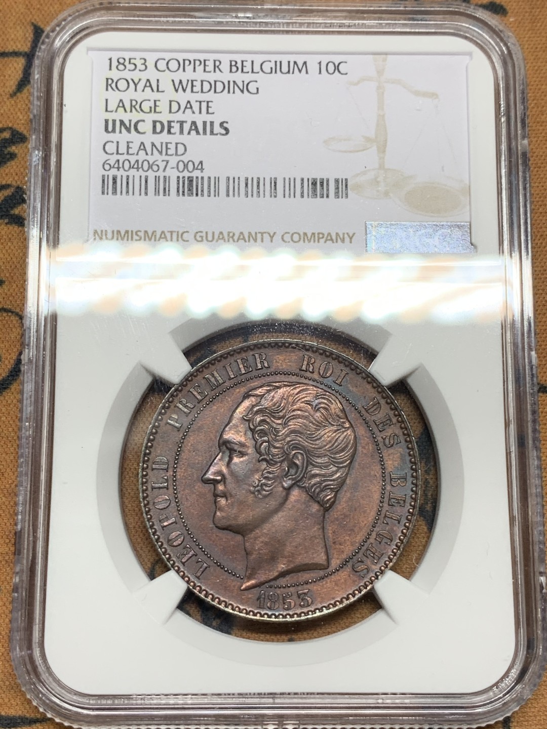 《竞宝斋》第106场-周日，周一 2场连拍（全场包邮） NGC UNC 比利时1853年王室婚礼纪念币10分大铜币，包浆好 细节不错 这个非常厚重