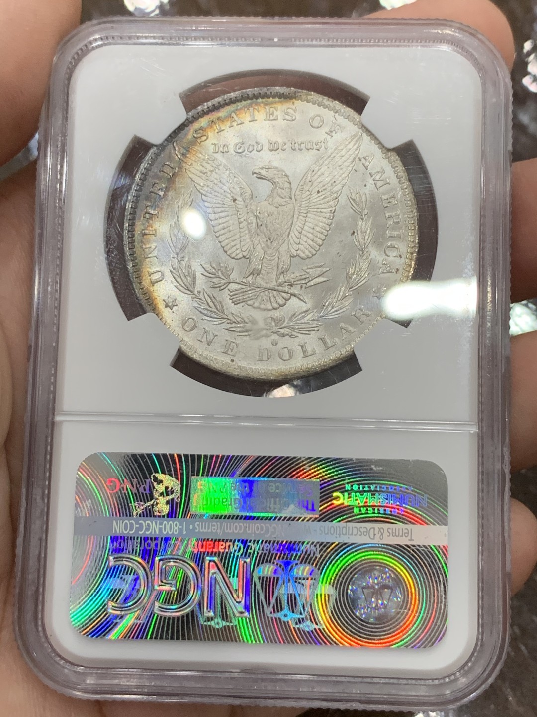 《竞宝斋》第106场-周日，周一 2场连拍（全场包邮） NGC-MS64 美国 1884年 摩根银币 女神面6点-10点 鹰面8点-1点均为rainbow七彩月牙 摩根最贵的彩种