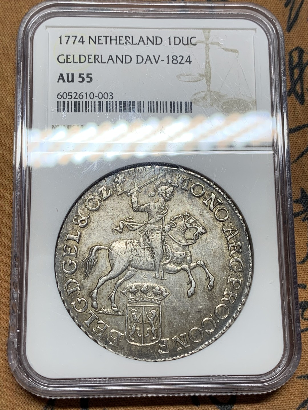 《竞宝斋》第106场-周日，周一 2场连拍（全场包邮） 唯一亚军 NGC AU55 荷兰 海尔德兰省 1774年 杜卡特 大马剑 银币 32克多的重量 原味的双面包浆 比较少的省份 这个工艺已经很好了 细节见图