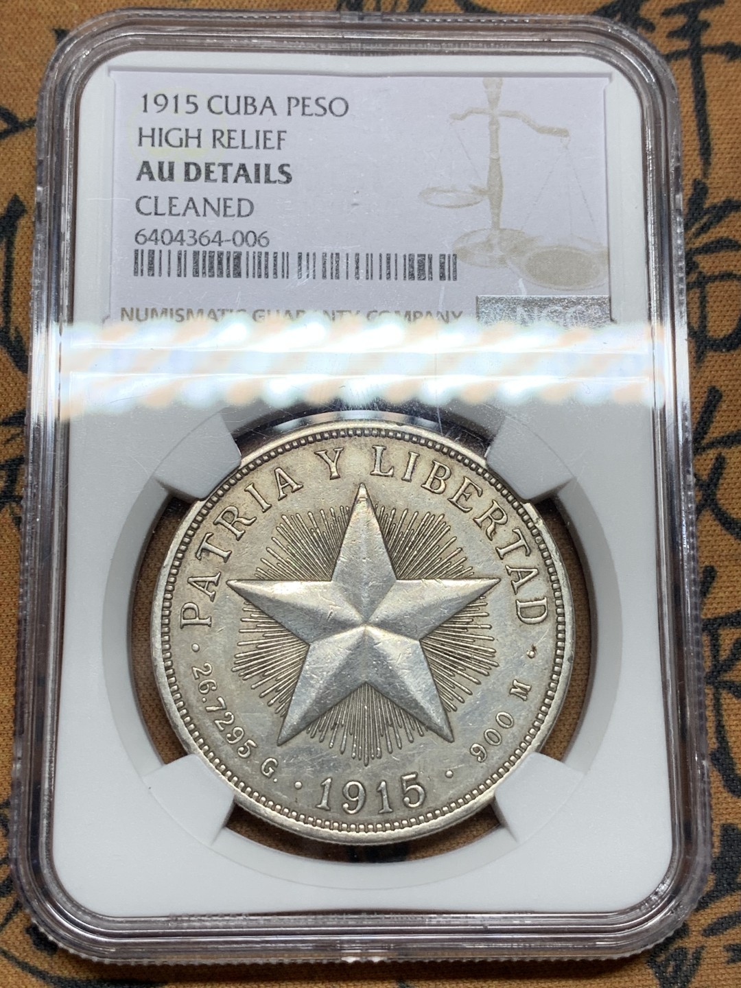 《竞宝斋》第106场-周日，周一 2场连拍（全场包邮） NGC-AUD 古巴 1915年 五星1比索大银币 相对高价的年份