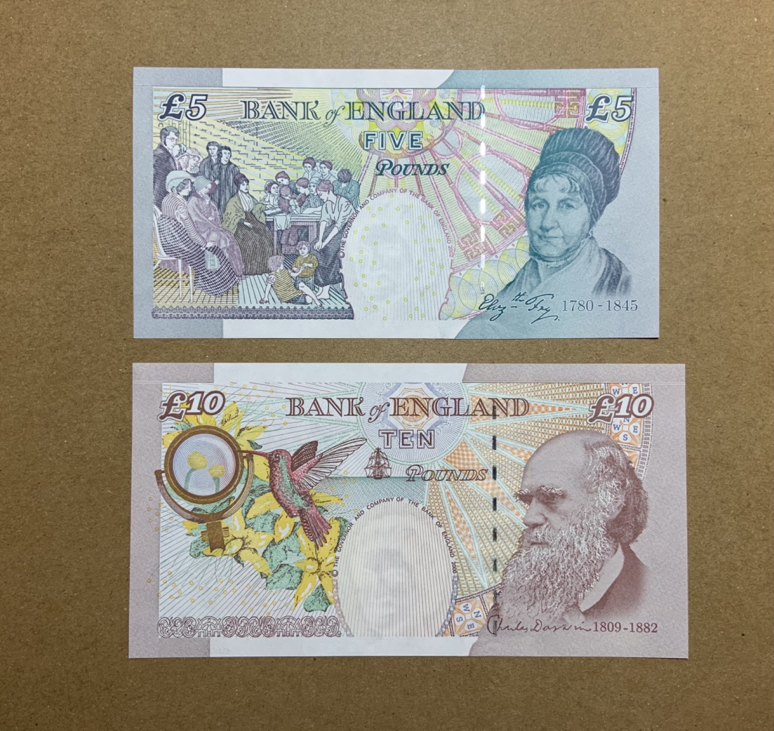 收藏联盟Quantum Auction 第199期拍卖  英国2012版5镑和2010版10镑 品相全新UNC 达尔文和女慈善家