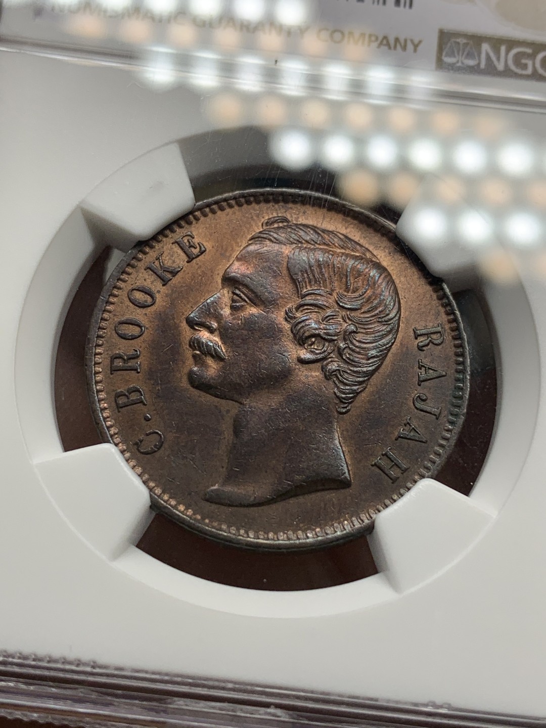 《竞宝斋》第107场-周日，周一 2场连拍（全场包邮） NGC AU58 BN 沙捞越1891年H 一分 铜币 自然细腻 五官发丝皆清晰