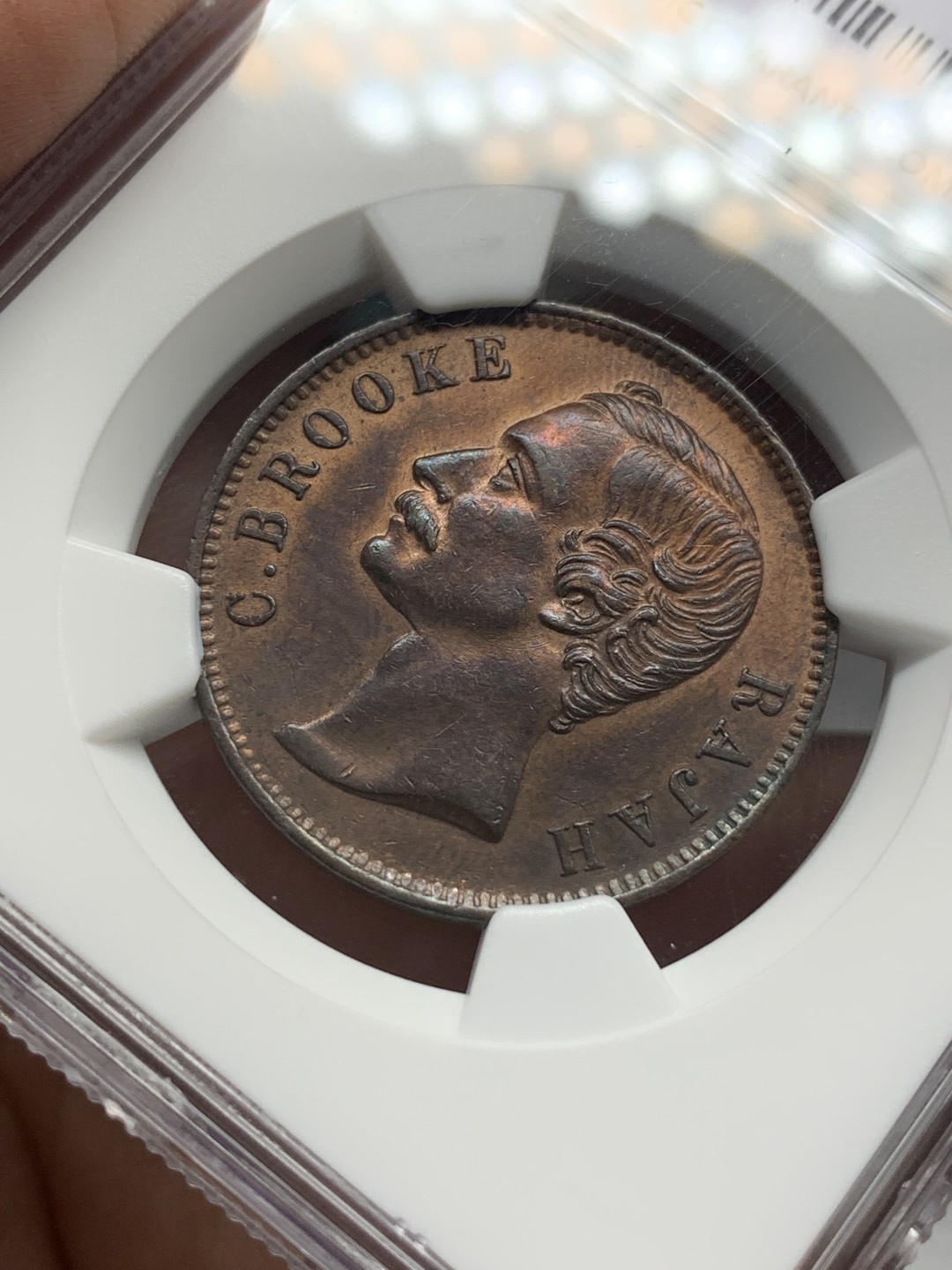 《竞宝斋》第107场-周日，周一 2场连拍（全场包邮） NGC AU58 BN 沙捞越1891年H 一分 铜币 自然细腻 五官发丝皆清晰