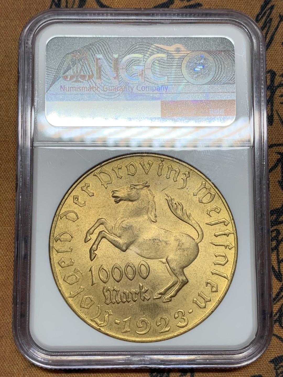 《竞宝斋》第107场-周日，周一 2场连拍（全场包邮） NGC MS64 德国 德紧1923年10000马克镀金大马铜币