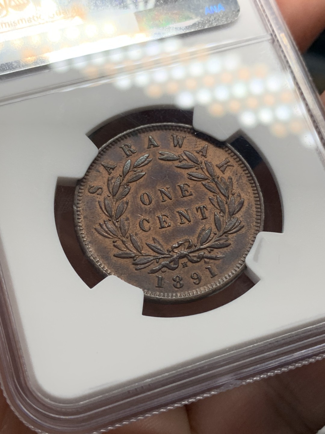 《竞宝斋》第107场-周日，周一 2场连拍（全场包邮） NGC AU58 BN 沙捞越1891年H 一分 铜币 自然细腻 五官发丝皆清晰