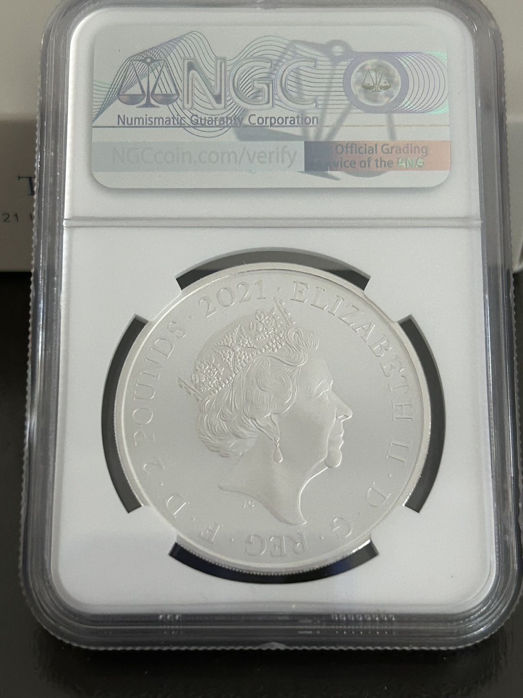 收藏联盟Quantum Auction 第199期拍卖  英国2021年2英镑1盎司彼得兔精制银币 NGC PF70UC 全网首枚满分 原装盒证