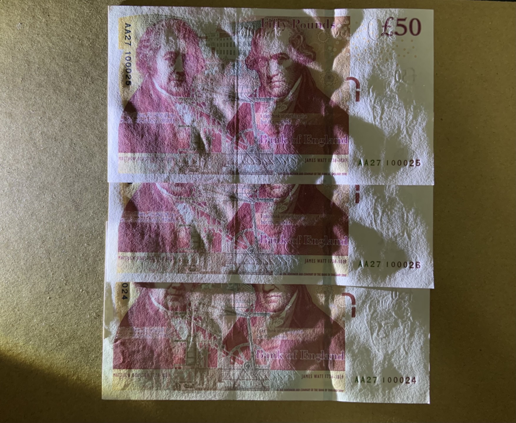 收藏联盟Quantum Auction 第200期拍卖  英国2010年50镑3连号 品相全新UNC AA冠且自带豹子号000 工程师瓦特(蒸汽机发明者)和其推广合作者博尔顿