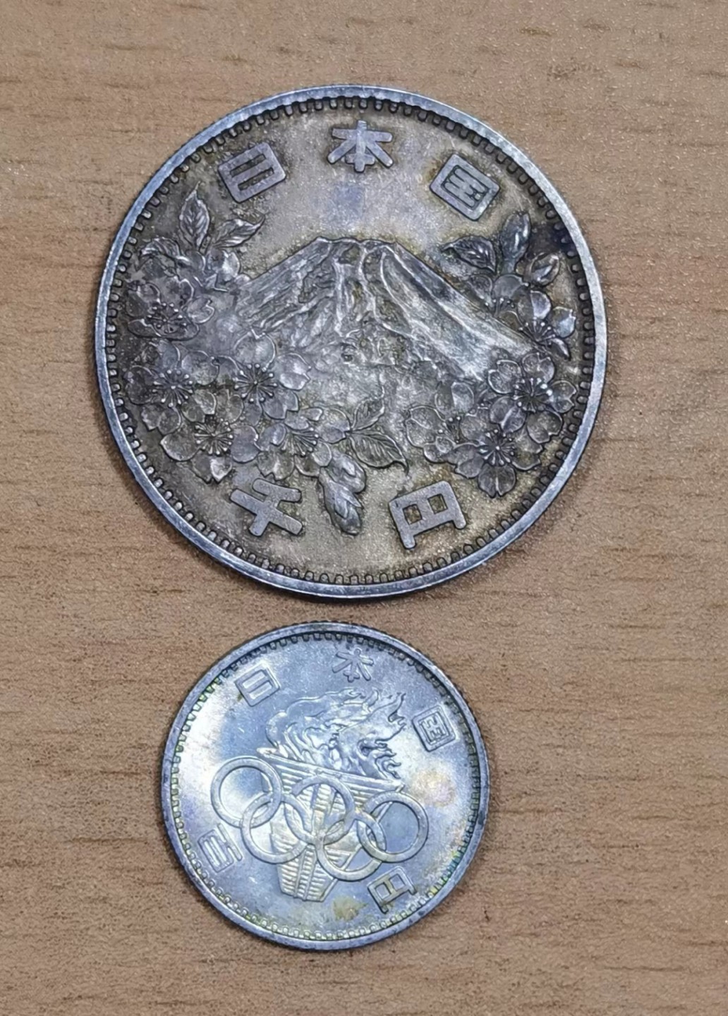 北京马甸外国币专卖微拍第八十七期，外国金银币专场，陆续上新，欢迎关注 1964年日本东京奥运会纪念银币1对，1000元重量：20克，成色：925，100元重量：9.6克，成色：600