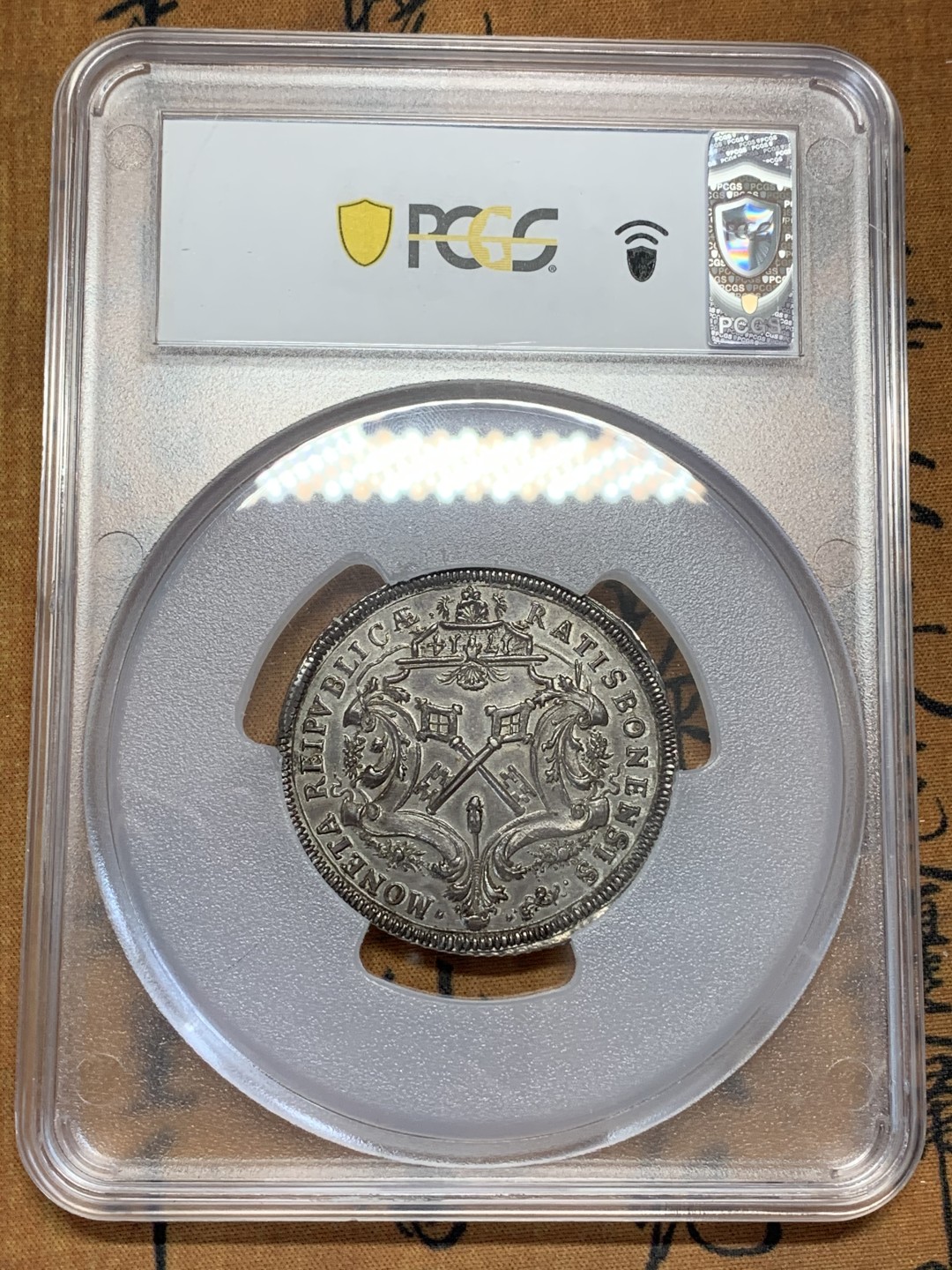 《竞宝斋》第108场-周日，周一 ，周四3场连拍（全场包邮） N和P双料冠军 PCGS MS63 神圣罗马帝国1714年 雷根斯堡市泰勒大银币，状态出色 包浆均匀，很稀少的品种，今年欧拍62分的总价6000欧成交