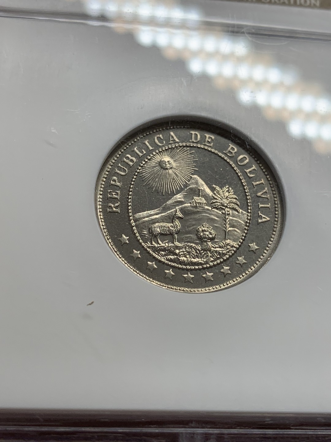 《竞宝斋》第108场-周日，周一 ，周四3场连拍（全场包邮） 1935年玻利维亚精制10分 PF66分，克书出谱品无记录，镜面感强烈，做工有别于流通币，NGC经典小白盒