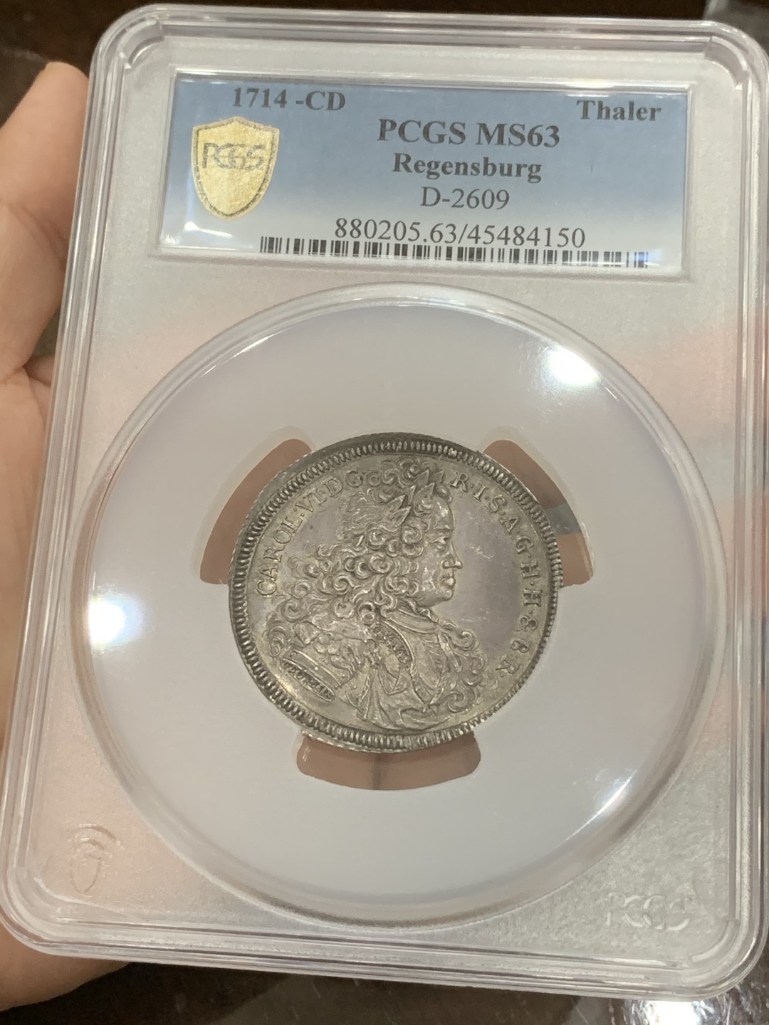 《竞宝斋》第108场-周日，周一 ，周四3场连拍（全场包邮） N和P双料冠军 PCGS MS63 神圣罗马帝国1714年 雷根斯堡市泰勒大银币，状态出色 包浆均匀，很稀少的品种，今年欧拍62分的总价6000欧成交