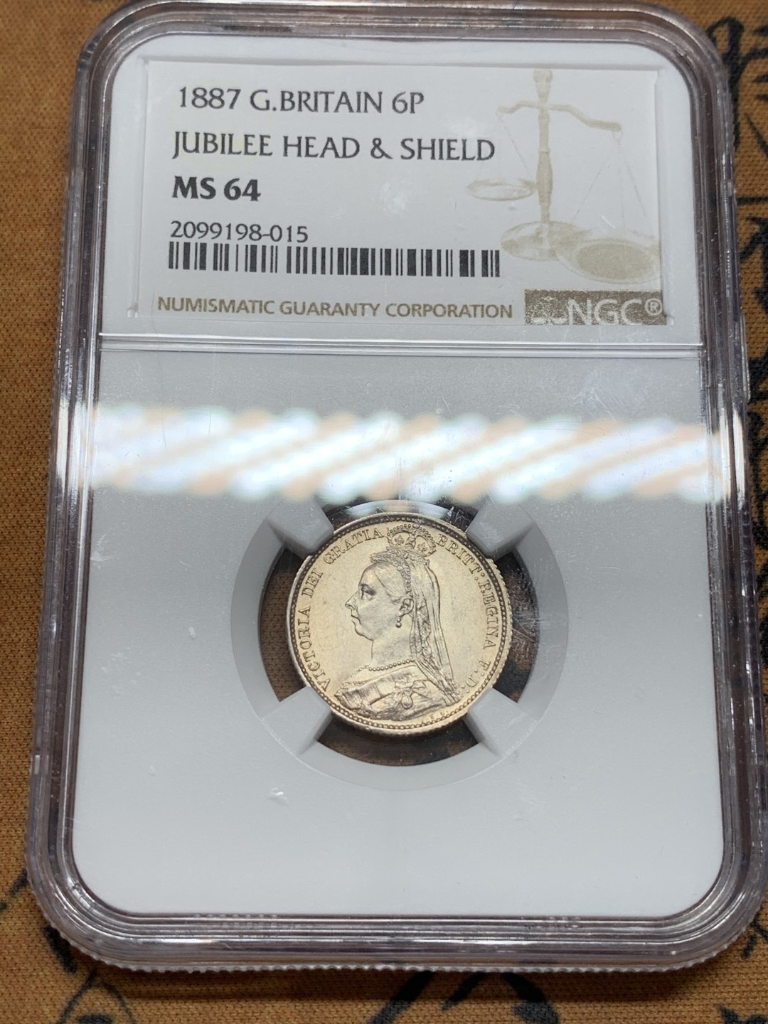 《竞宝斋》第108场-周日，周一 ，周四3场连拍（全场包邮） NGC-MS64 1887年英国维多利亚高冠6便士嘉德版银币。双面淡彩，收藏佳品