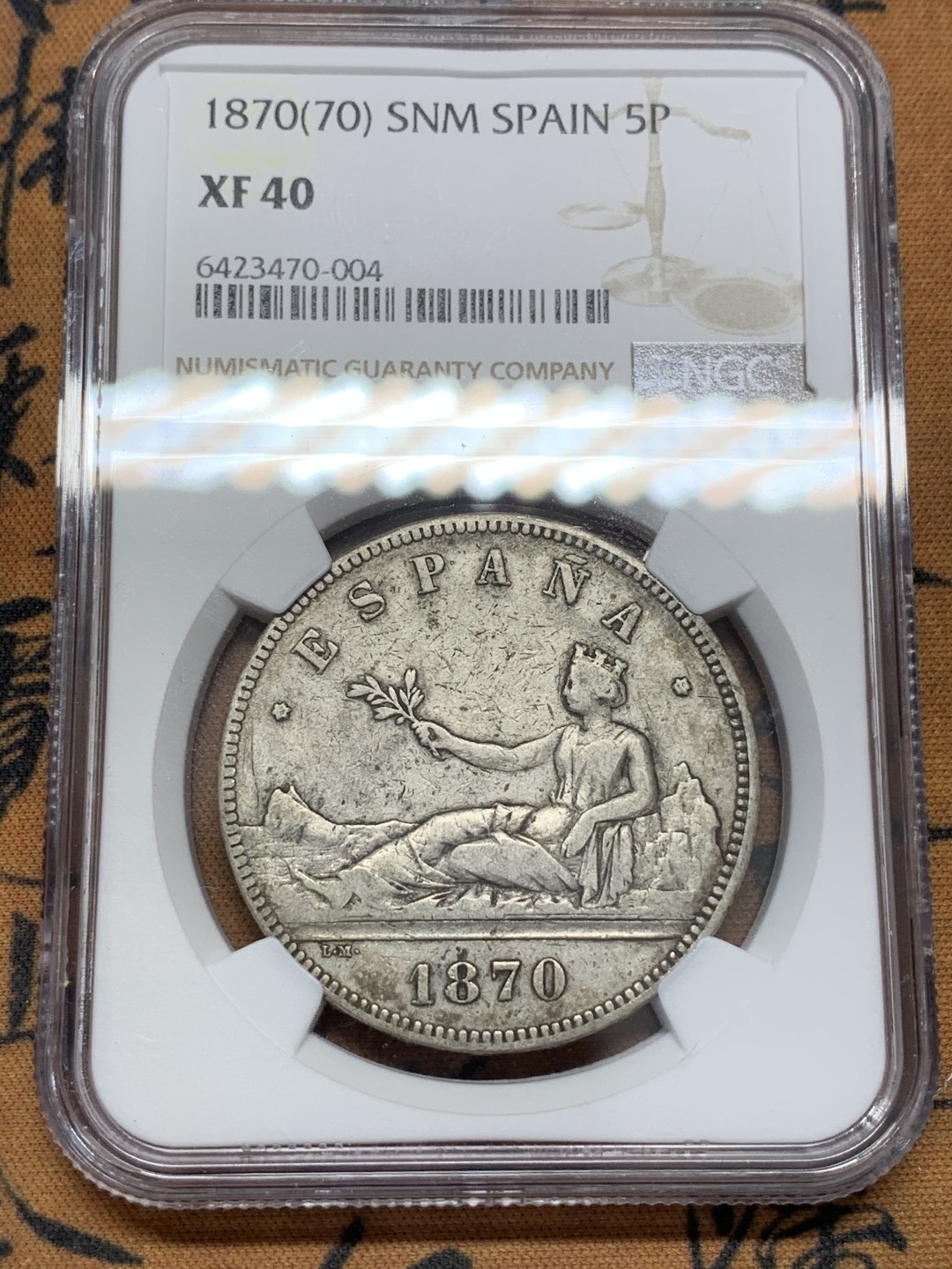 《竞宝斋》第108场-周日，周一 ，周四3场连拍（全场包邮） NGC XF40 西班牙 1870年 坐人拿花 5比塞塔 银币 原味包浆 不错