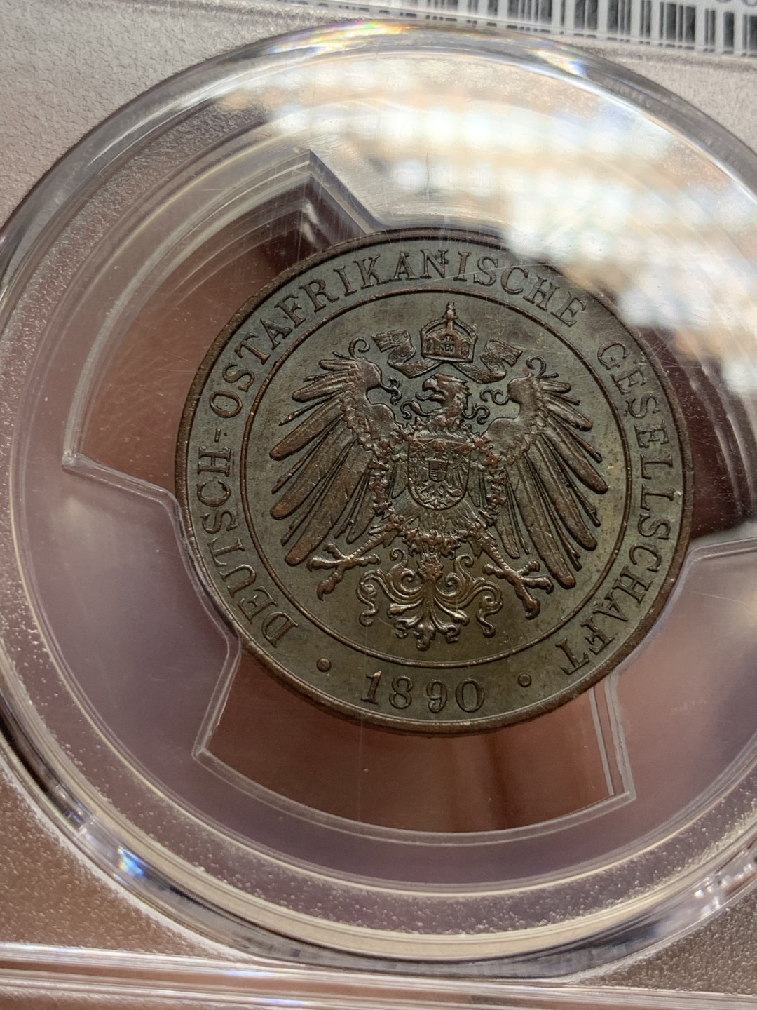 《竞宝斋》第108场-周日，周一 ，周四3场连拍（全场包邮） PCGS-MS64BN 德属东非 1890年 1Pesa 派沙 巧克力包浆漂亮