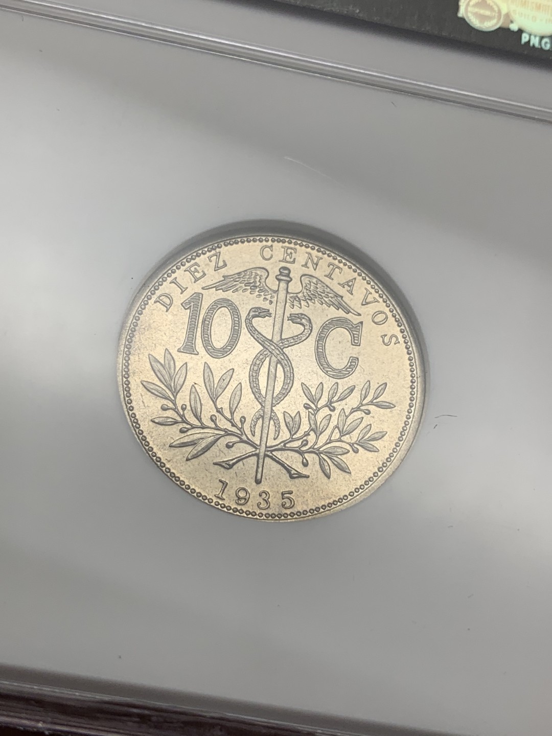 《竞宝斋》第108场-周日，周一 ，周四3场连拍（全场包邮） 1935年玻利维亚精制10分 PF66分，克书出谱品无记录，镜面感强烈，做工有别于流通币，NGC经典小白盒