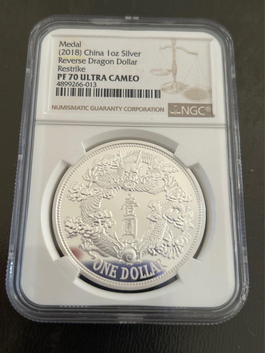 收藏联盟Quantum Auction 第203期拍卖 硬币场 2018年造 大清宣三一元银币 现代复刻纪念章 NGC PF70UC 评级壳子右下角有一处磕碰伤