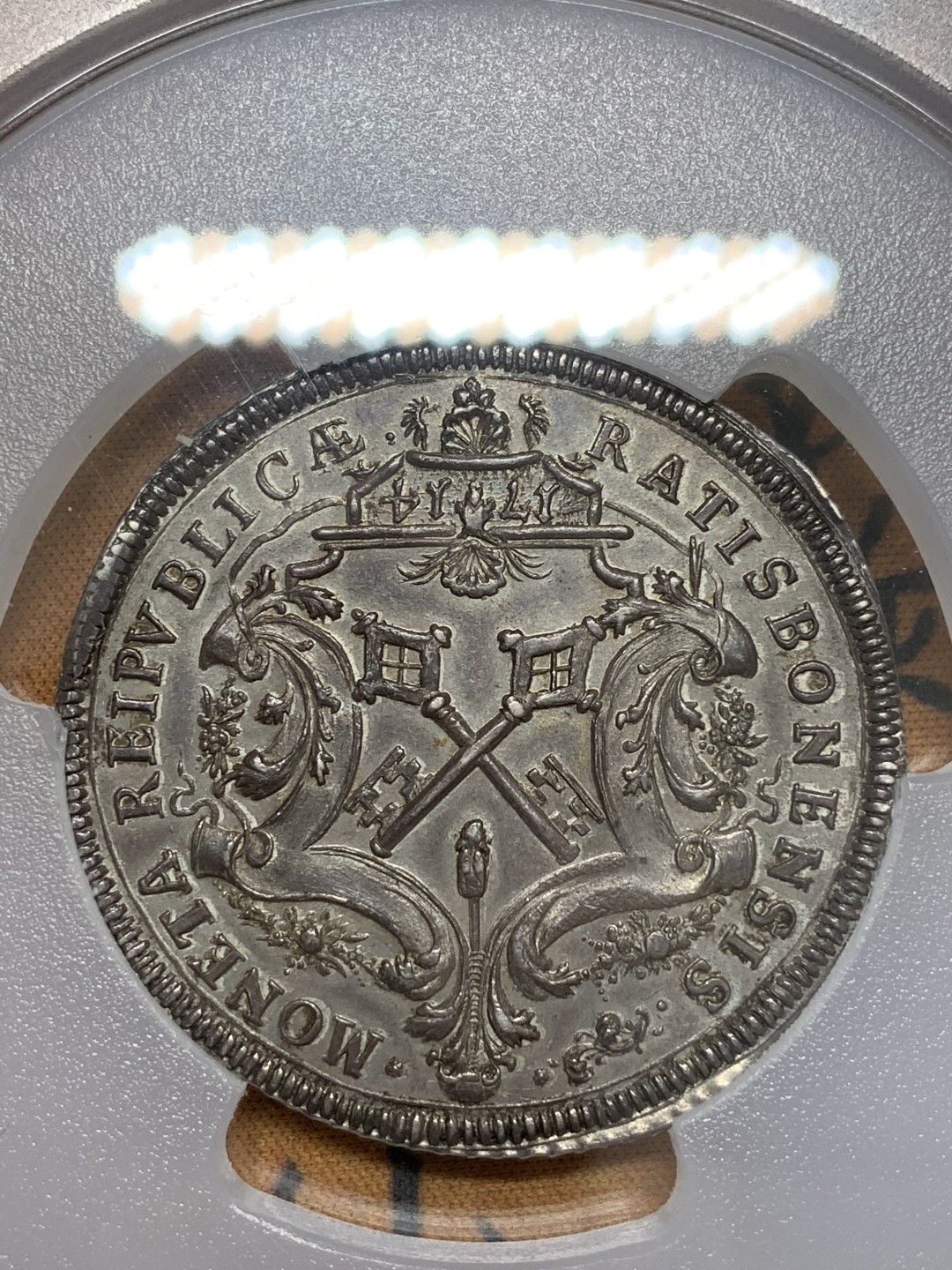 《竞宝斋》第108场-周日，周一 ，周四3场连拍（全场包邮） N和P双料冠军 PCGS MS63 神圣罗马帝国1714年 雷根斯堡市泰勒大银币，状态出色 包浆均匀，很稀少的品种，今年欧拍62分的总价6000欧成交