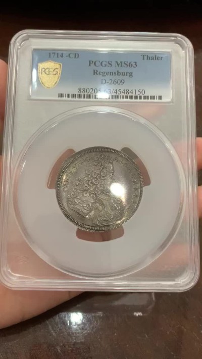 《竞宝斋》第108场-周日，周一 ，周四3场连拍（全场包邮） N和P双料冠军 PCGS MS63 神圣罗马帝国1714年 雷根斯堡市泰勒大银币，状态出色 包浆均匀，很稀少的品种，今年欧拍62分的总价6000欧成交