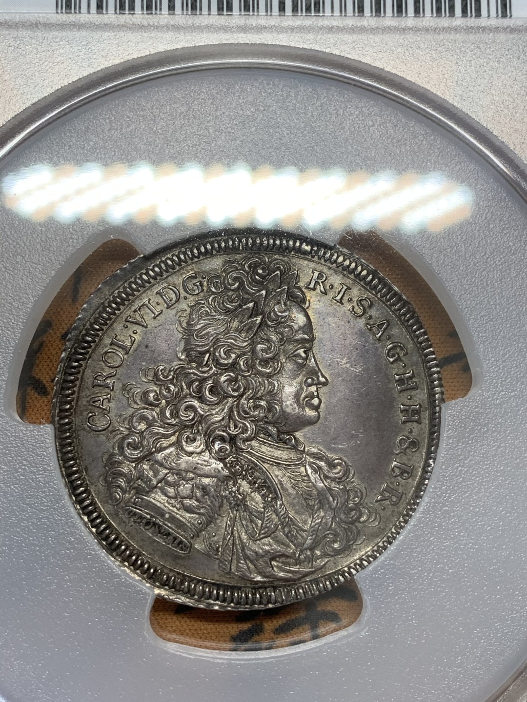 《竞宝斋》第108场-周日，周一 ，周四3场连拍（全场包邮） N和P双料冠军 PCGS MS63 神圣罗马帝国1714年 雷根斯堡市泰勒大银币，状态出色 包浆均匀，很稀少的品种，今年欧拍62分的总价6000欧成交