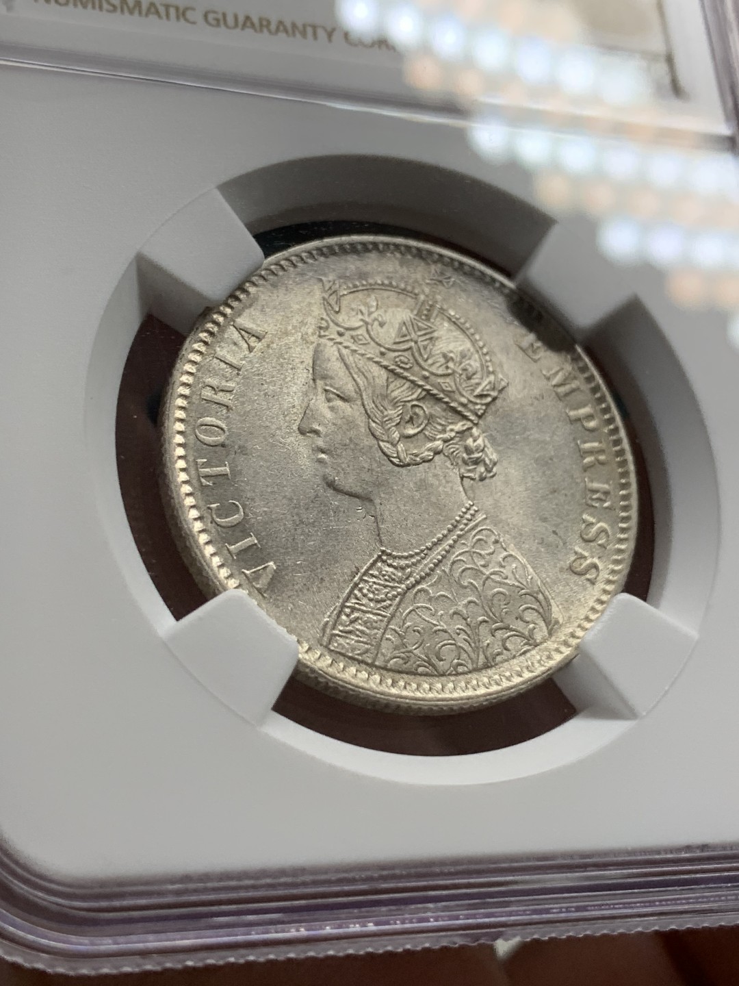 《竞宝斋》第108场-周日，周一 ，周四3场连拍（全场包邮） NGC MS61 1887年维多利亚印度卢比 低估品种！