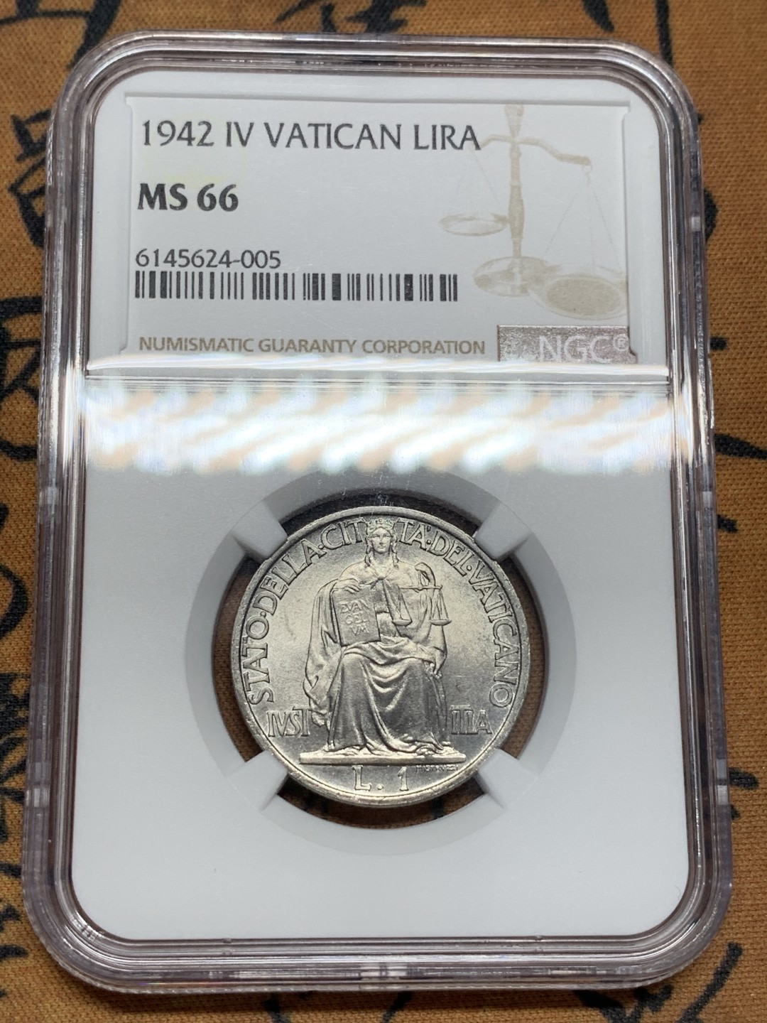 《竞宝斋》第108场-周日，周一 ，周四3场连拍（全场包邮） NGC-MS66 梵蒂冈 1942年 1里拉 收藏分数