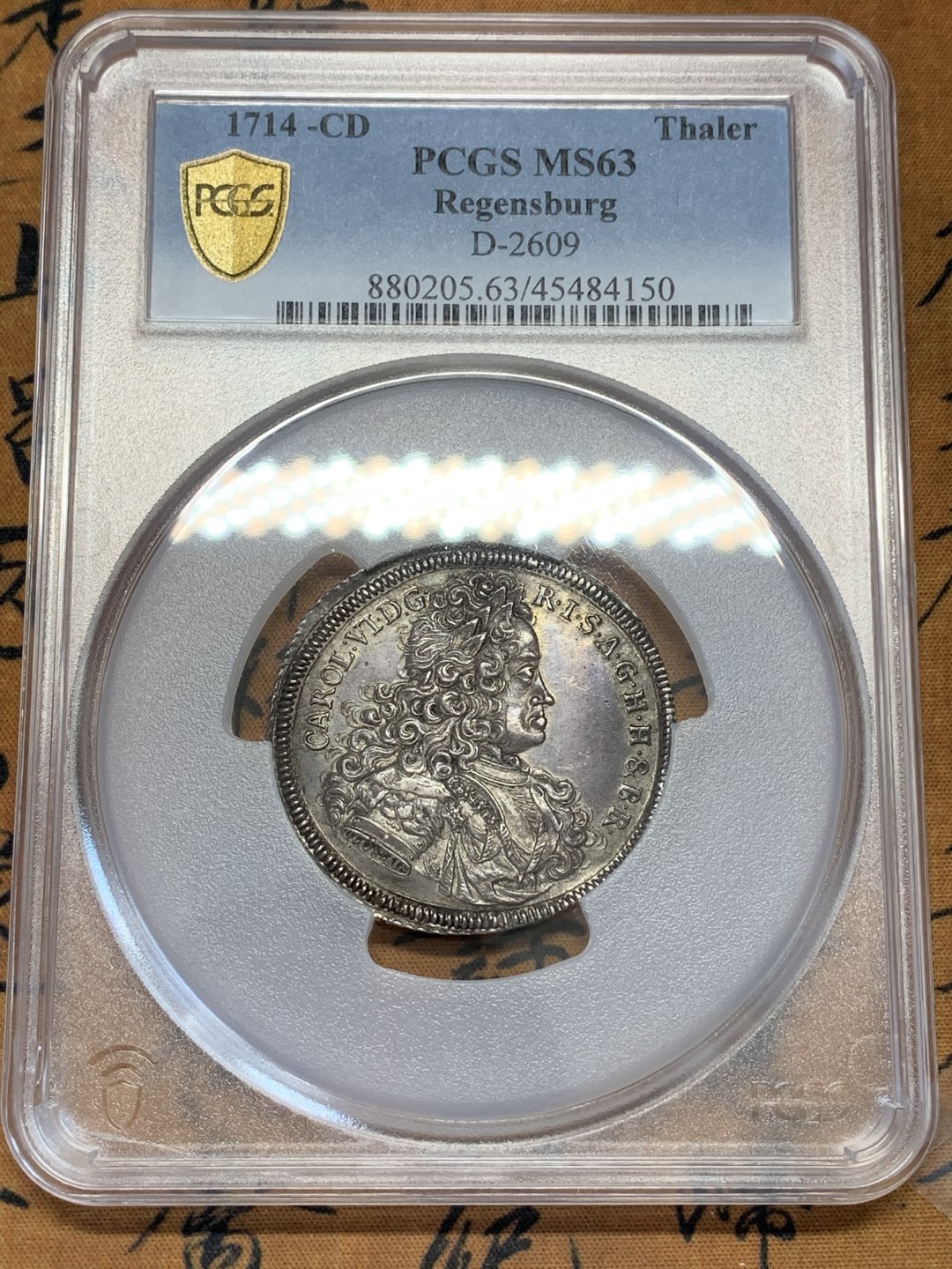 《竞宝斋》第108场-周日，周一 ，周四3场连拍（全场包邮） N和P双料冠军 PCGS MS63 神圣罗马帝国1714年 雷根斯堡市泰勒大银币，状态出色 包浆均匀，很稀少的品种，今年欧拍62分的总价6000欧成交