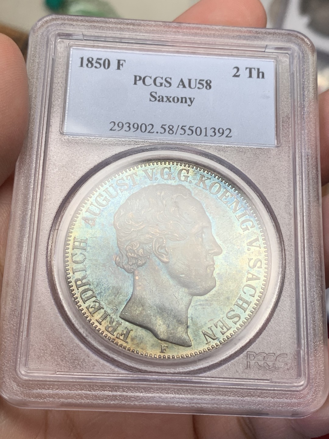 《竞宝斋》第108场-周日，周一 ，周四3场连拍（全场包邮） PCGS-AU58 1850F德国萨克森大窗帘2泰勒大银币，镜面底板，深彩包浆，青蓝与金黄融合，如梦似幻，细节完整，不可多得的佳品，老盒严评的产物