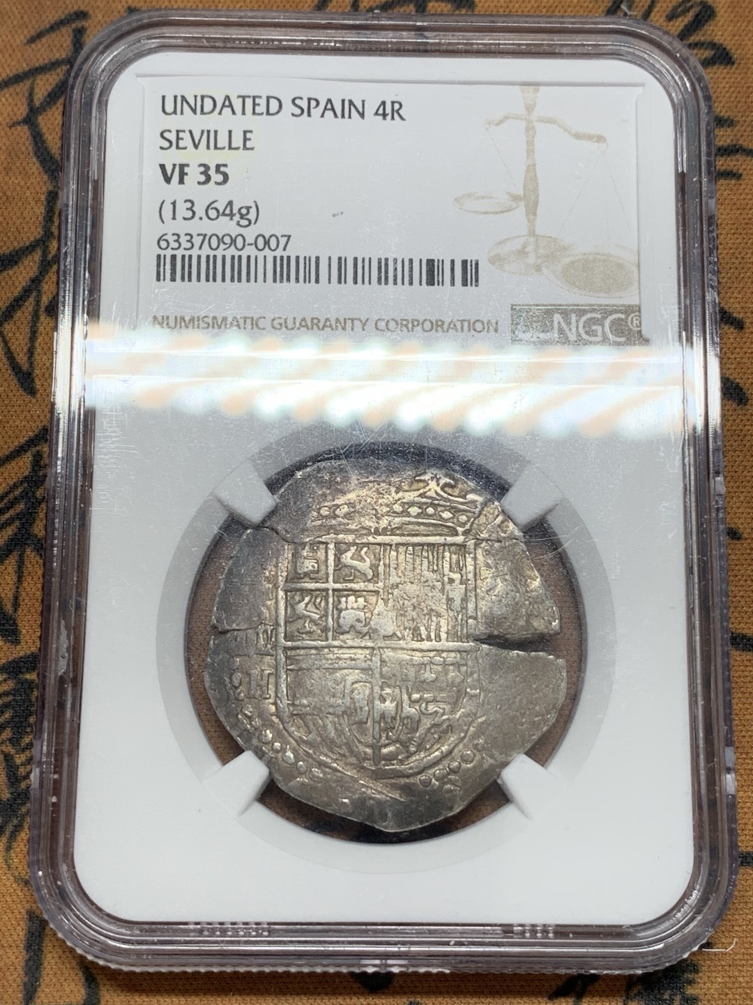 《竞宝斋》第108场-周日，周一 ，周四3场连拍（全场包邮） NGC-VF35 1591-H 西班牙打制cob 菲利普二世 4里亚尔银币 塞维利亚厂 盾徽基本完整，面值和验银师签名可见，厂别年份 Calico-584/585 出分不易，很多cob都有环境损伤或海捞就没法出分