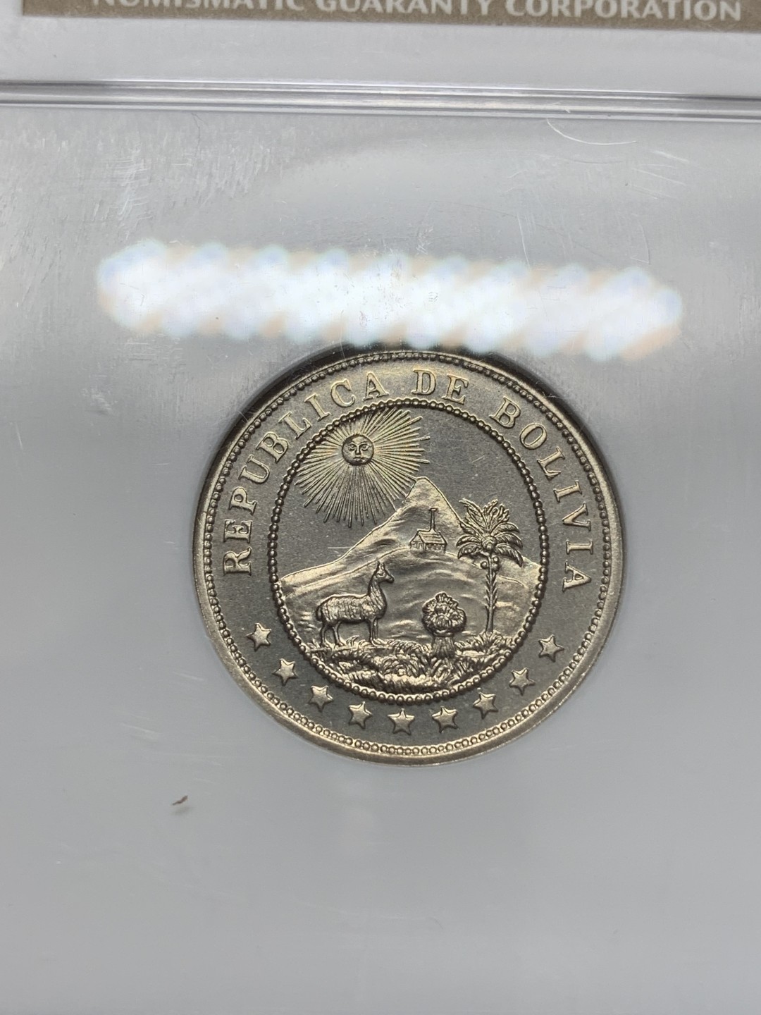 《竞宝斋》第108场-周日，周一 ，周四3场连拍（全场包邮） 1935年玻利维亚精制10分 PF66分，克书出谱品无记录，镜面感强烈，做工有别于流通币，NGC经典小白盒