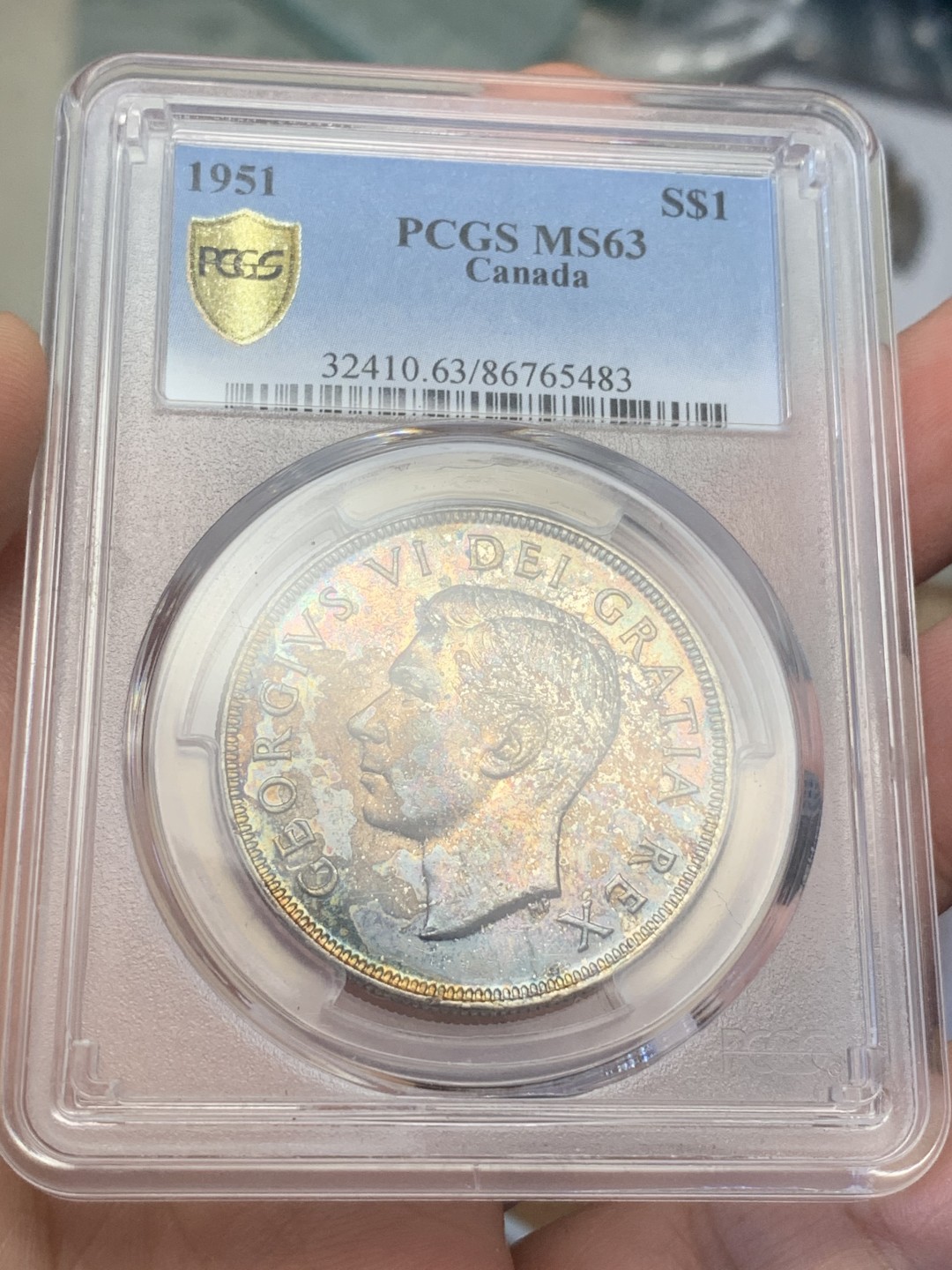 《竞宝斋》第109场-周日，周一 ，周四3场连拍（全场包邮） PCGS-MS63 加拿大 1951年 划船1加元银币 加拿大知名品种 五彩包浆 非常漂亮