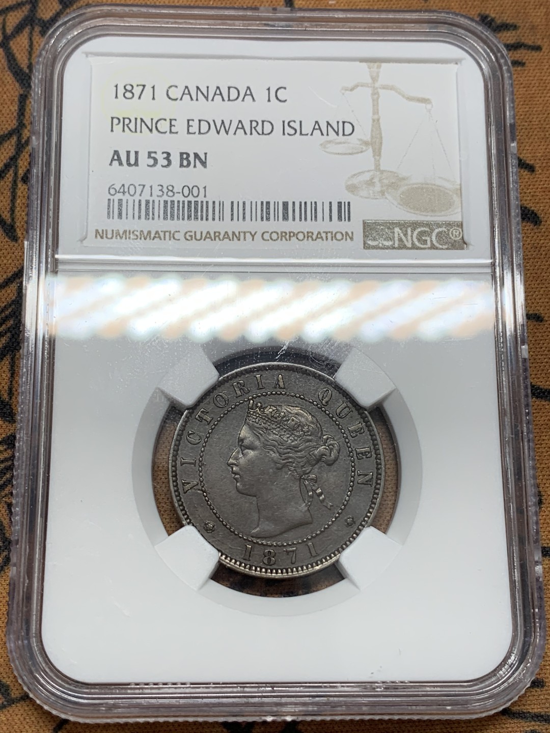 《竞宝斋》第109场-周日，周一 ，周四3场连拍（全场包邮） NGC-AU53 1871年 维多利亚女王 爱德华王子岛1分铜币 维皇像+橡树，少见品种。深棕色均匀包浆，细节很好。加拿大的诞生之地