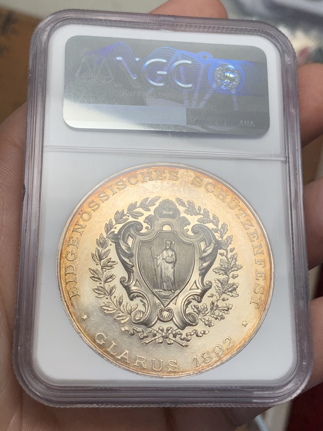 《竞宝斋》第109场-周日，周一 ，周四3场连拍（全场包邮） NGC MS61 瑞士 1892年 格拉鲁斯射击节大银章 镜面底板 金色包浆 低评好品好状态