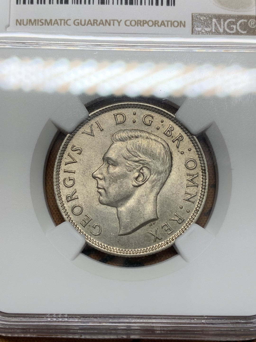 《竞宝斋》第109场-周日，周一 ，周四3场连拍（全场包邮） NGC-MS62 英国 1941 乔治六世福林 铁灰色包浆好看 亚军分