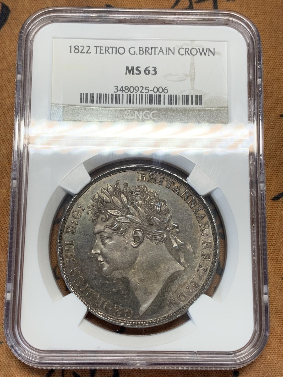 《竞宝斋》第109场-周日，周一 ，周四3场连拍（全场包邮） NGC MS63 英国 1822年 乔四 克朗银币 PL 底板 双面均匀深色包浆 状态好于分数 63分未见最近拍卖记录 2022年62分2.9W成交 高分相对价高很多