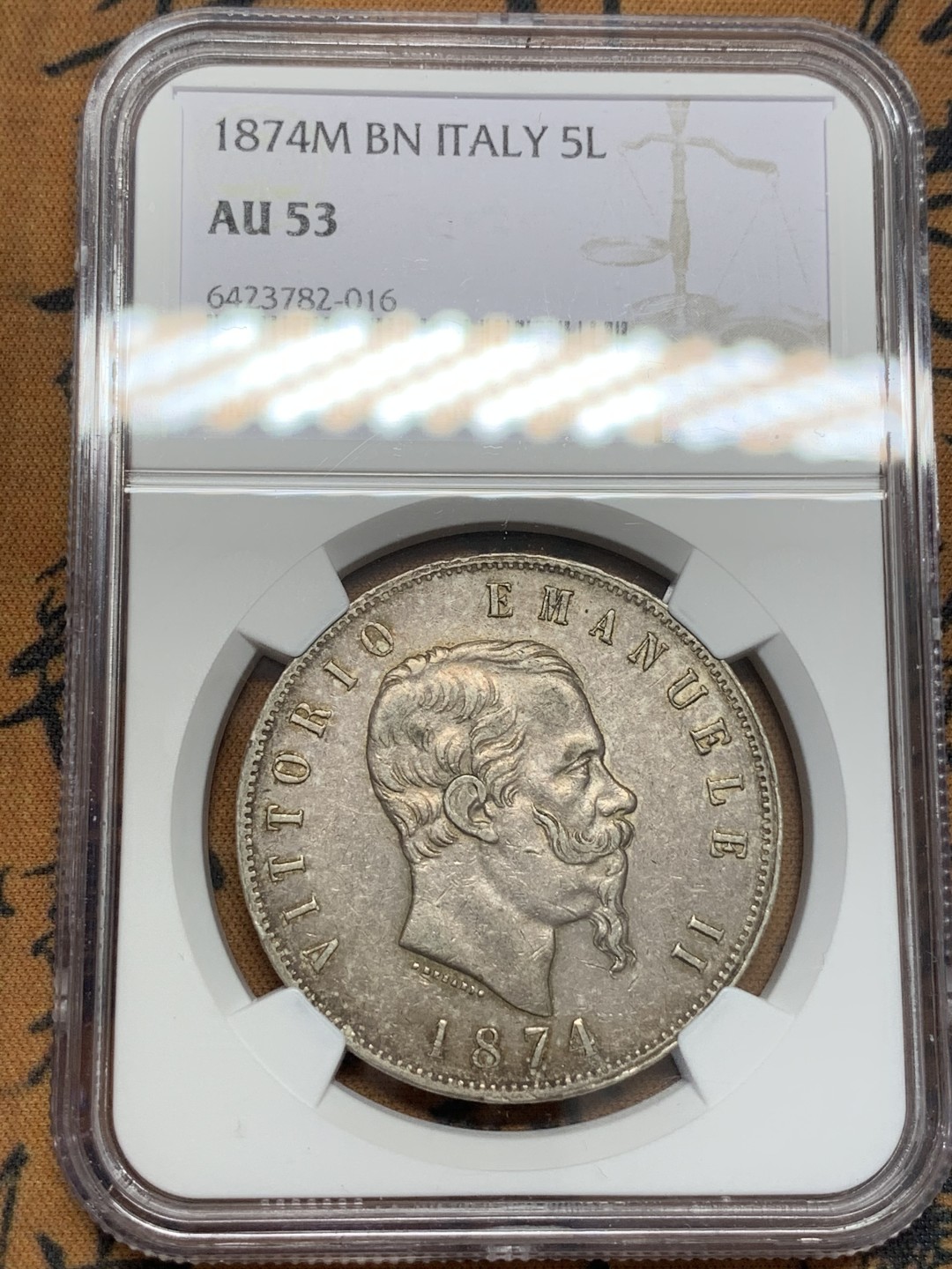 《竞宝斋》第109场-周日，周一 ，周四3场连拍（全场包邮） NGC-AU53 意大利1874年 艾曼纽尔二世5里拉大银币 原味老包浆