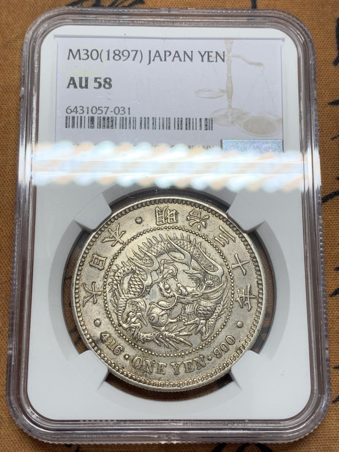 《竞宝斋》第109场-周日，周一 ，周四3场连拍（全场包邮） NGC AU58 日本1897年明治三十年龙洋1元银币，原光淡包浆