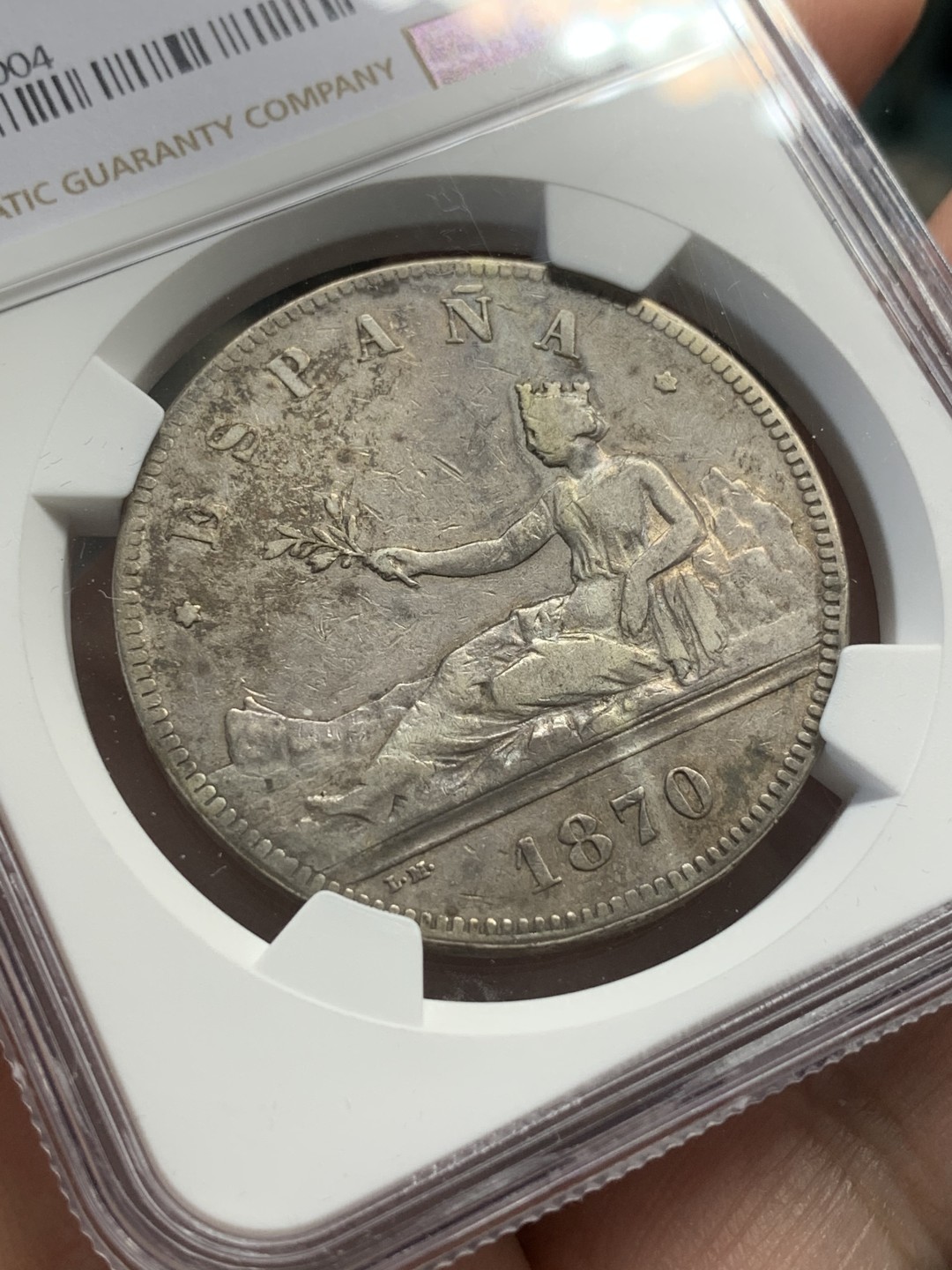 《竞宝斋》第109场-周日，周一 ，周四3场连拍（全场包邮） NGC VF35 西班牙 1870年 拿花 5比塞塔原味流通品