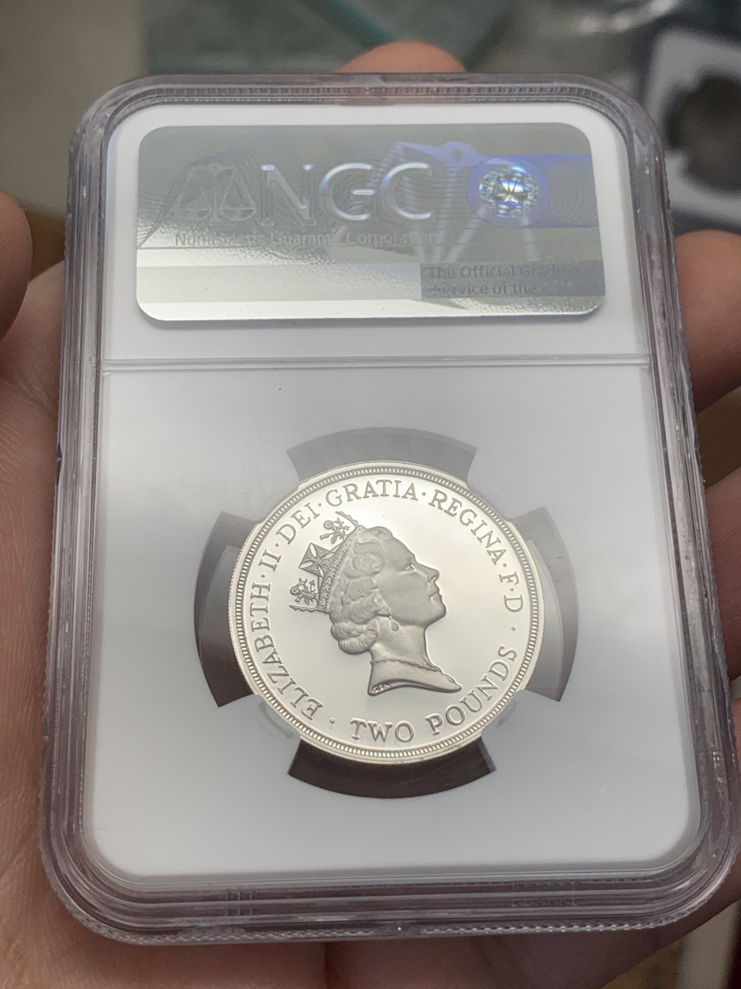 《竞宝斋》第109场-周日，周一 ，周四3场连拍（全场包邮） NGC PF69UC 英国 1995年 联合国成立50周年（中年女王头像）2英镑纪念币 银币 超厚币胚