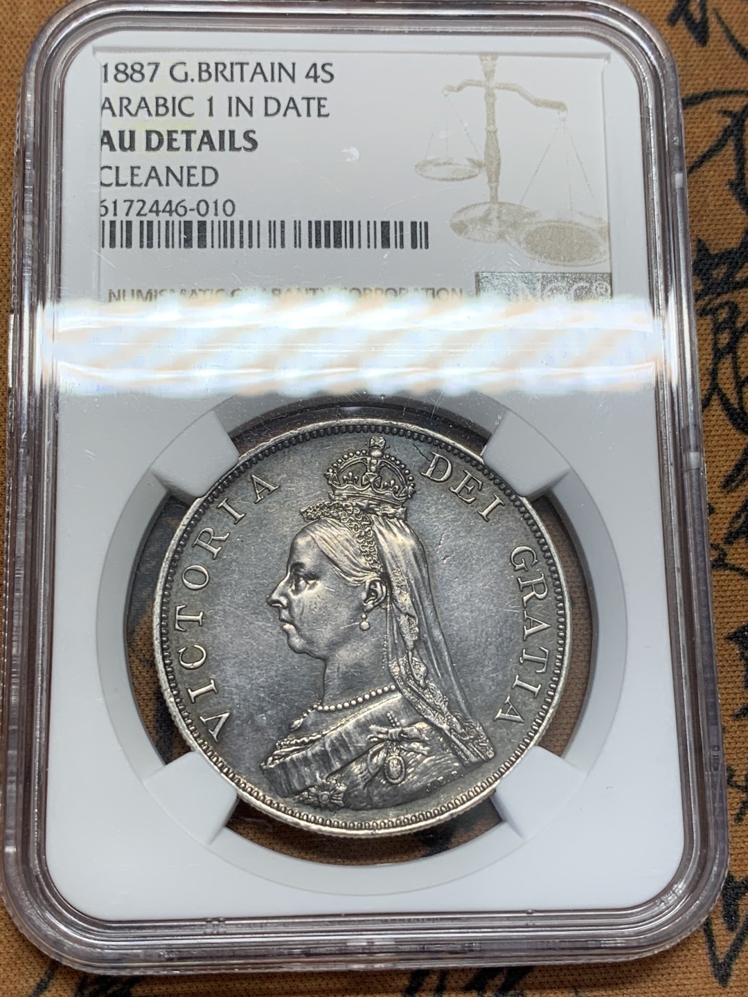 《竞宝斋》第109场-周日，周一 ，周四3场连拍（全场包邮） NGC AU评级 英国 1887年 维多利亚 高冠 双福林=4先令 大银币 双面均匀深色包浆 状态不错