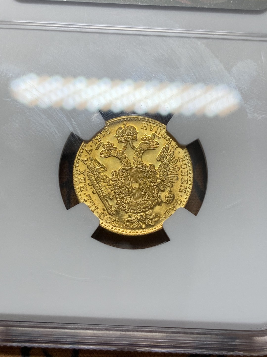 《竞宝斋》第109场-周日，周一 ，周四3场连拍（全场包邮） NGC MS67 奥地利 1915年 弗朗茨一世1杜卡特金币 3.49克 986高纯度金 强镜面效果 铸币工艺明显高于1892年贸易金 该枚金币首年为1901年 1915年为该金币后铸年份同时也为该金币的关门年份