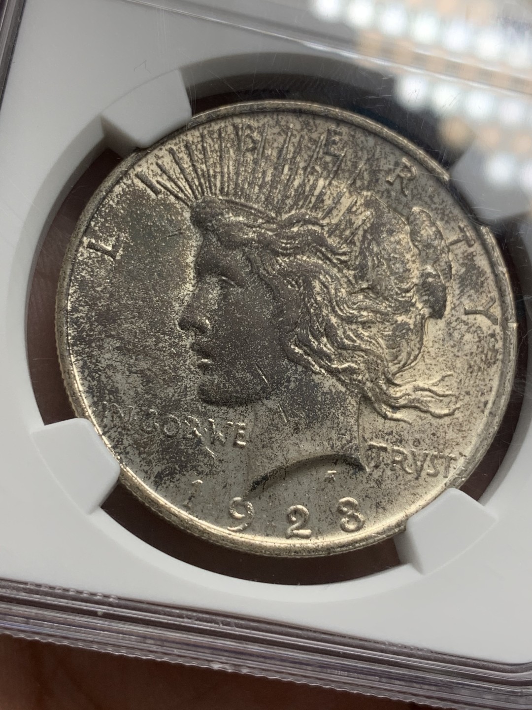 《竞宝斋》第109场-周日，周一 ，周四3场连拍（全场包邮） NGC-MS63 美国 1923年 和平银币 女神面黑彩 背黑金彩 和平彩少见 黑彩几乎不见