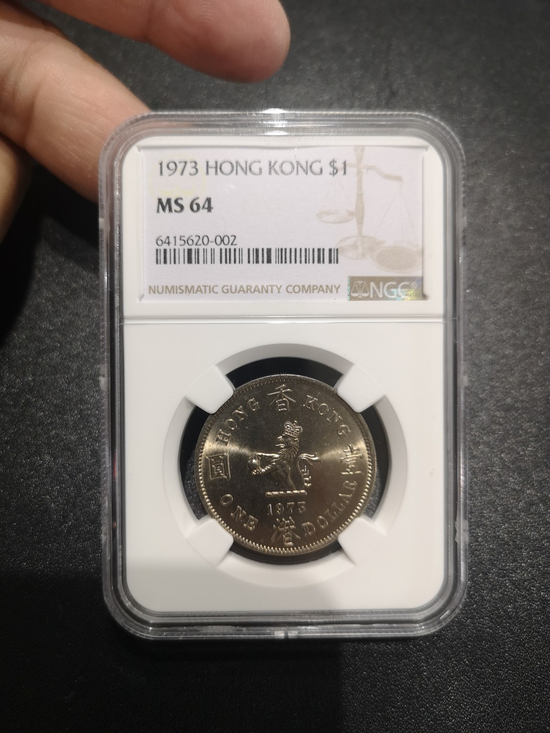 《外钞收藏家》第二百一十二期 1973年香港1元 NGC64分