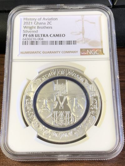 【海寧潮】拍卖第四十六期 - 【海寧潮客户代拍】加纳2021莱特兄弟镶嵌聚合物环铜镍合金纪念币NGC-PF68,铜镍合金，24.2克，40毫米，发行5000枚