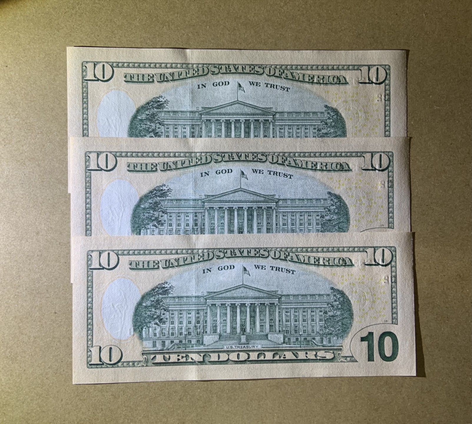 收藏联盟Quantum Auction 第202期拍卖 美国联邦储备券2017年10元三连号 品相全新UNC 号码无4且豹子号333开头