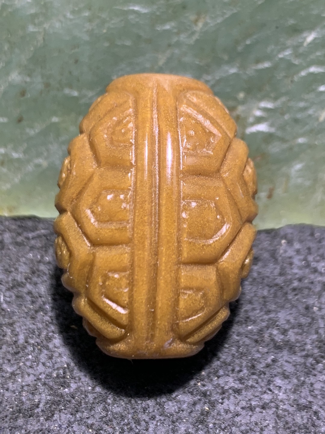 精美金沙战国红玛瑙双面雕刻龟壳桶珠一个，寓意：富甲天下，