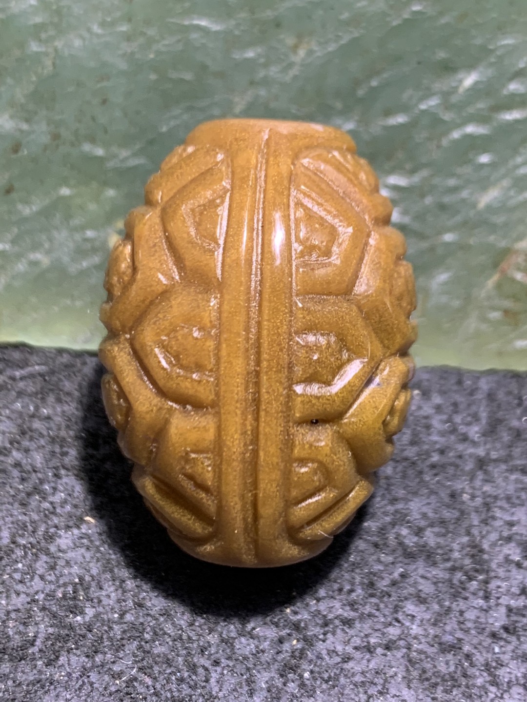 精美金沙战国红玛瑙双面雕刻龟壳桶珠一个，寓意：富甲天下，