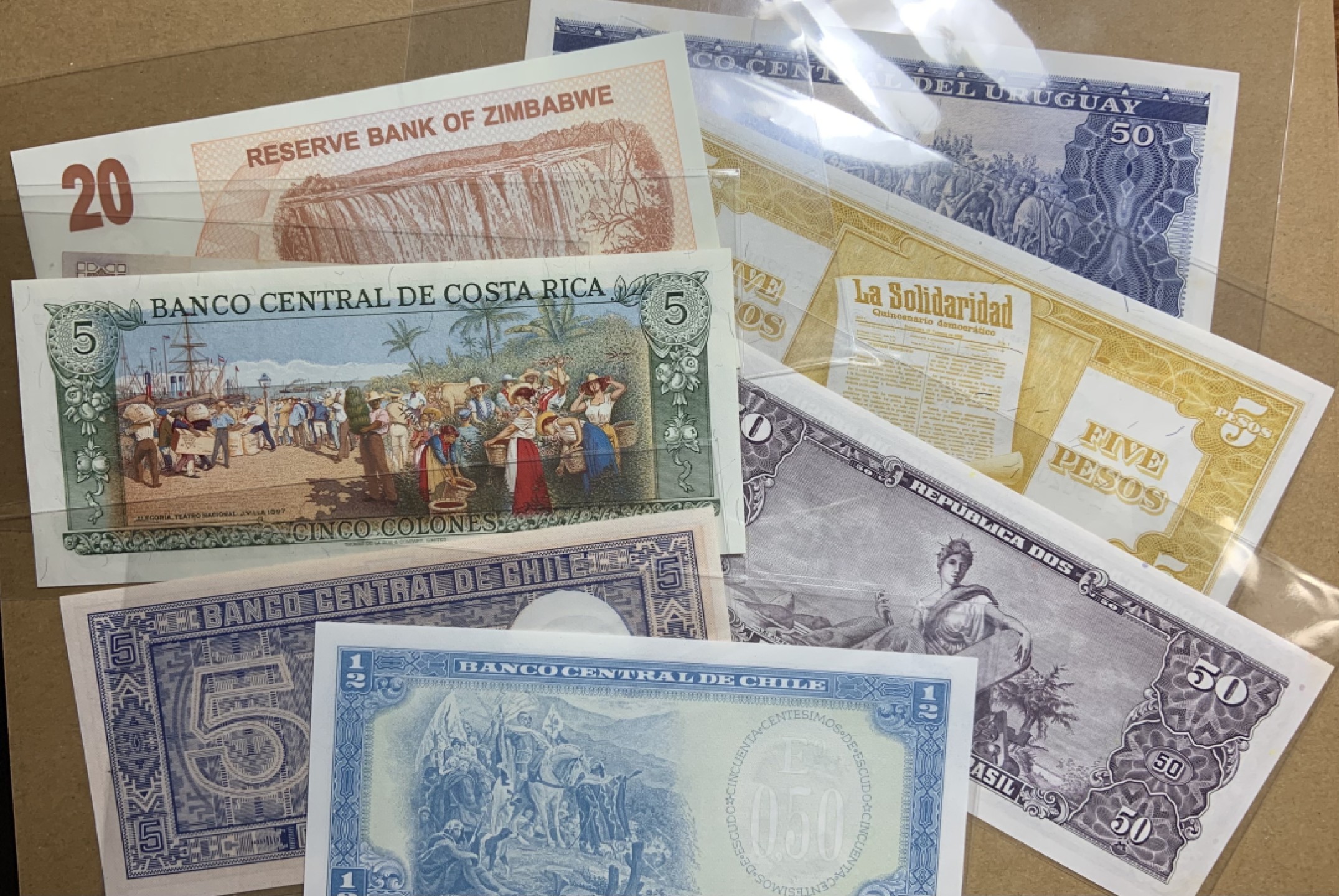 收藏联盟Quantum Auction 第202期拍卖 南美洲(巴西，巴拉圭，哥斯达黎加)和巴基斯坦纸币 品相UNC 个别有黄