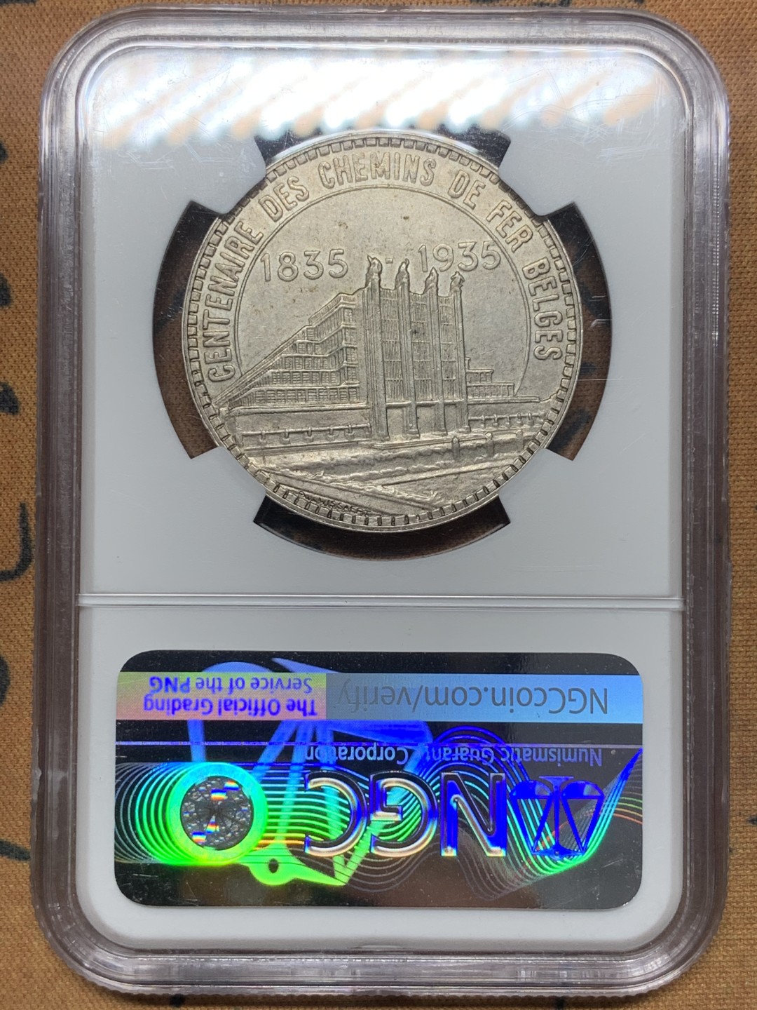《竞宝斋》第111场-周日，周一 ，2场连拍（全场包邮） NGC AU评级 比利时 1935年 布鲁塞尔世博会 50法郎银币 原味包浆 细节很好，鼻尖无磨损给AU 不知道说什么了