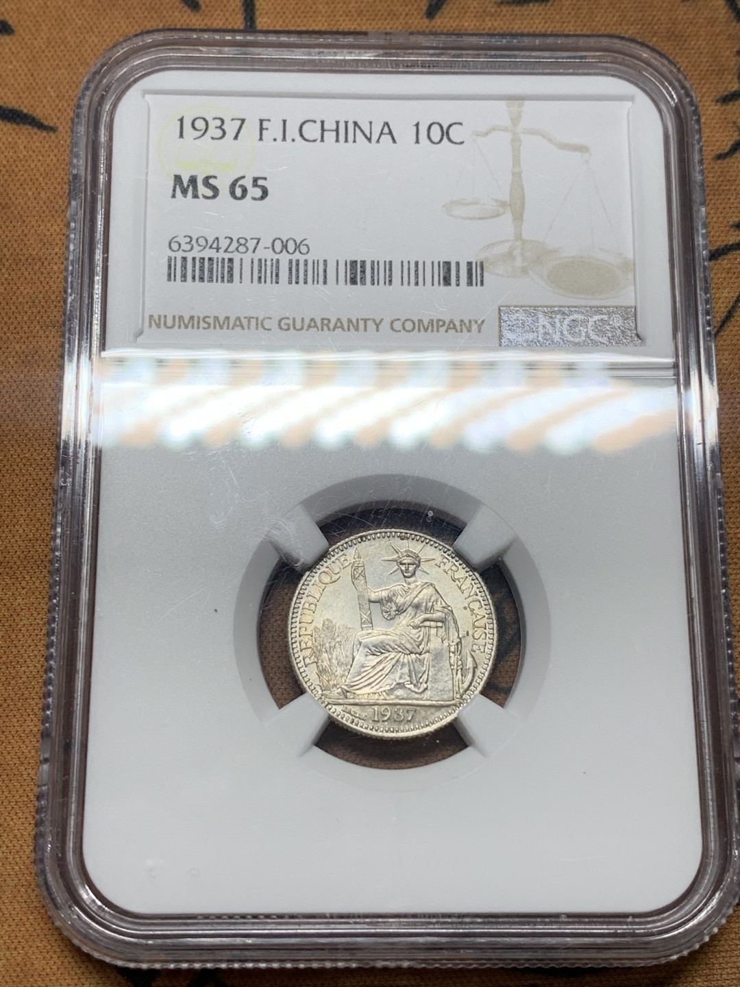 《竞宝斋》第111场-周日，周一 ，2场连拍（全场包邮） NGC MS65 印支 1937年 坐人 10分银币 细节极好 季军分 细节极好 十字转光